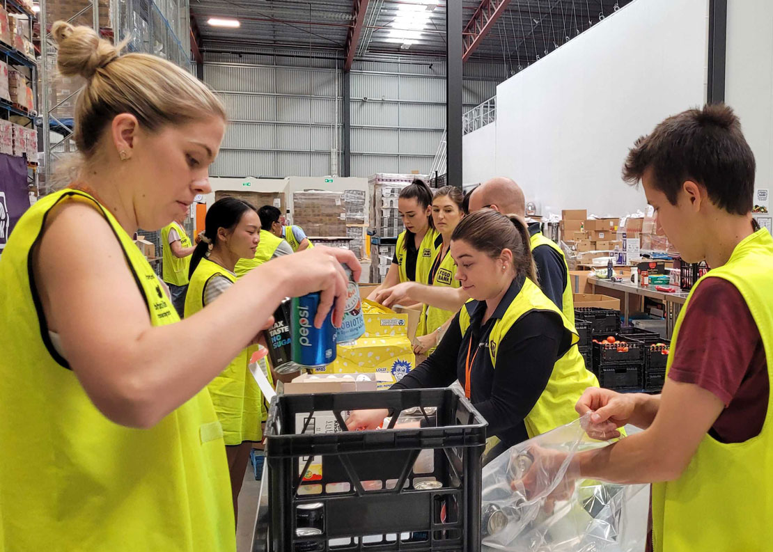 Veritas staff production line for food hampers