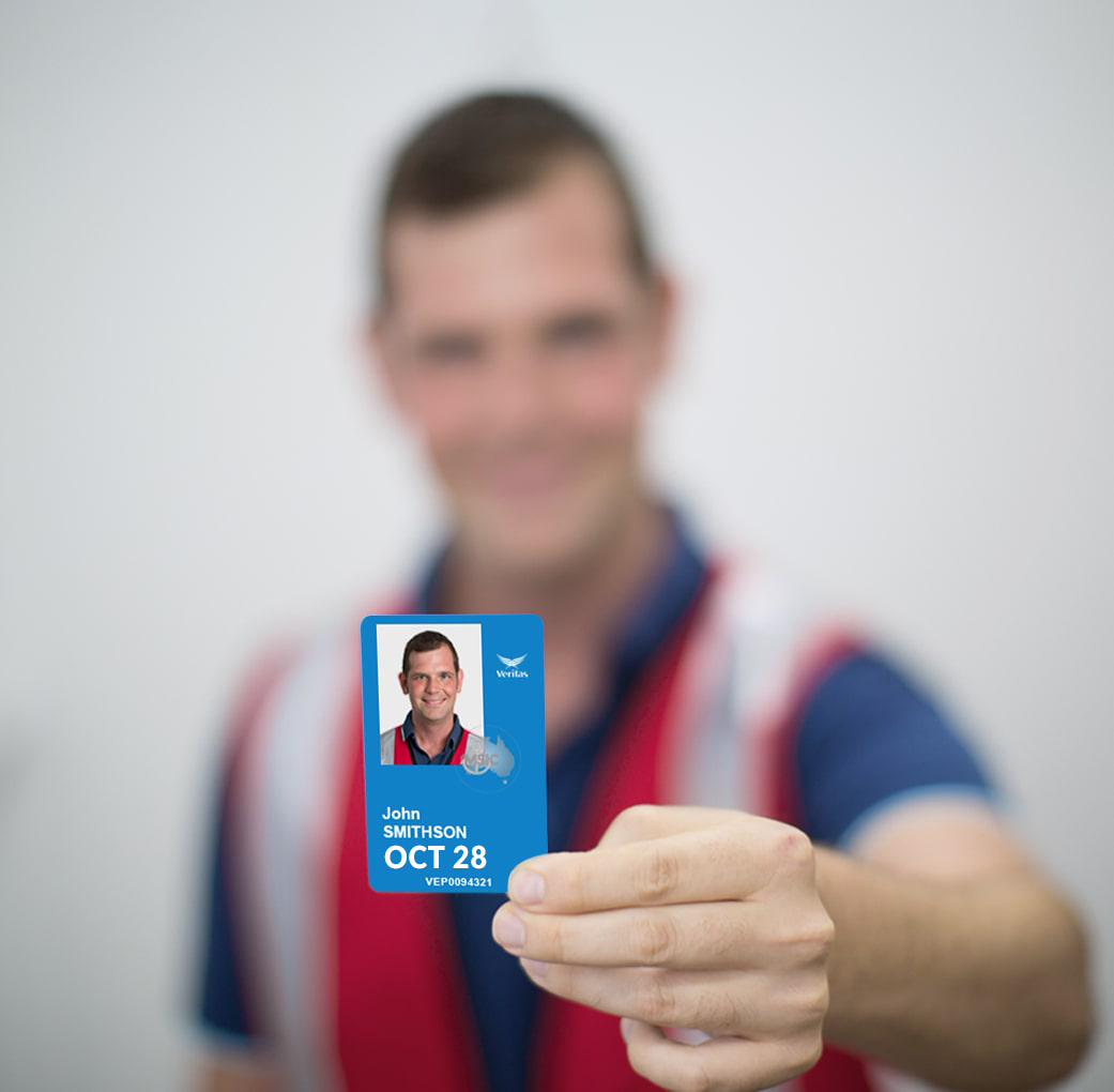 man holding MSIC card